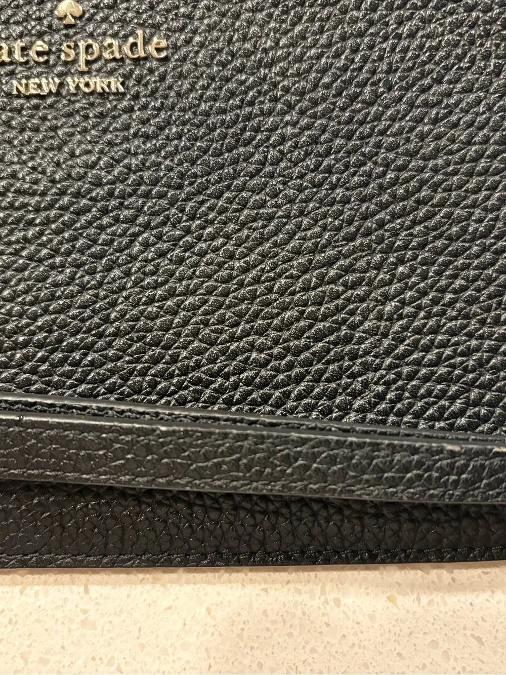 kate spade black pebbled leather zip card holder with wrist strap